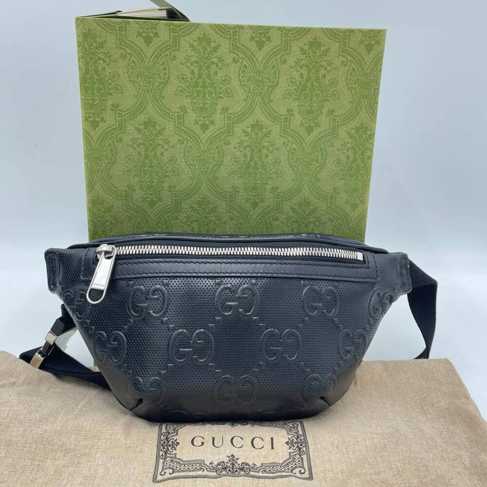 GUCCI GG embossed leather waist bag body belt black